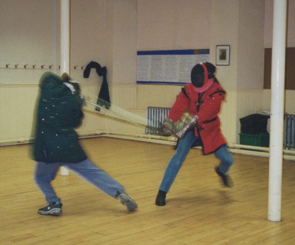 learning about safety in historical martial arts- the hard way! Kieran hitting Guy in the head