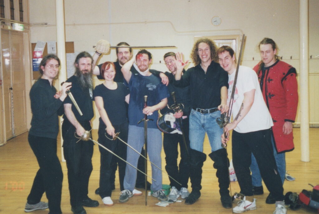 A happy crew despite a bleeding head wound. Safety in historical martial arts is paramount!