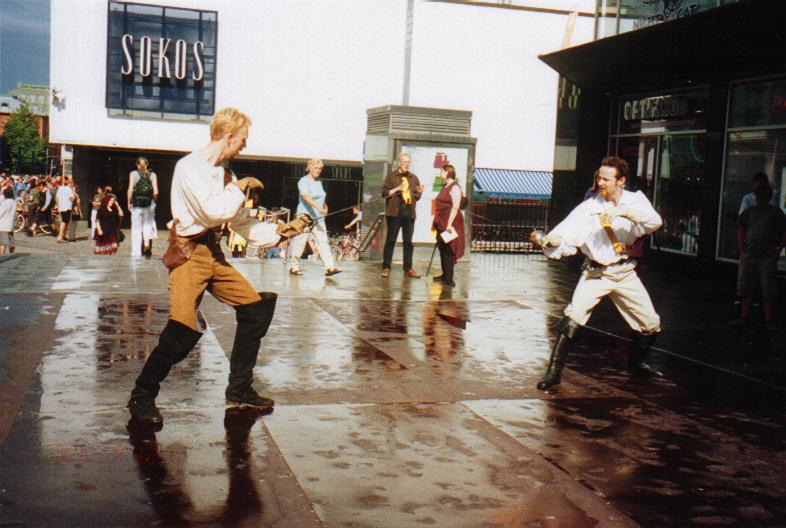Gareth Hunt and Guy doing demo fights at Finnconn, 2001